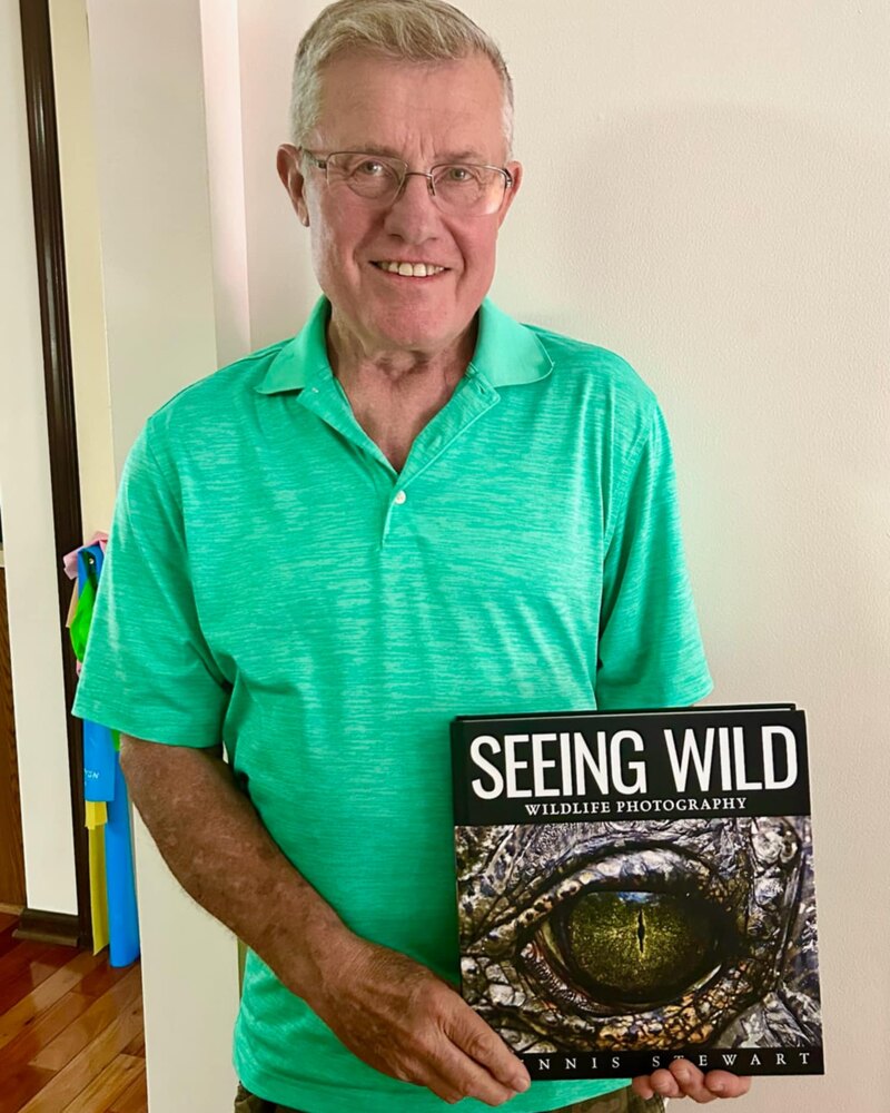 Reader presenting a copy of Seeing Wild